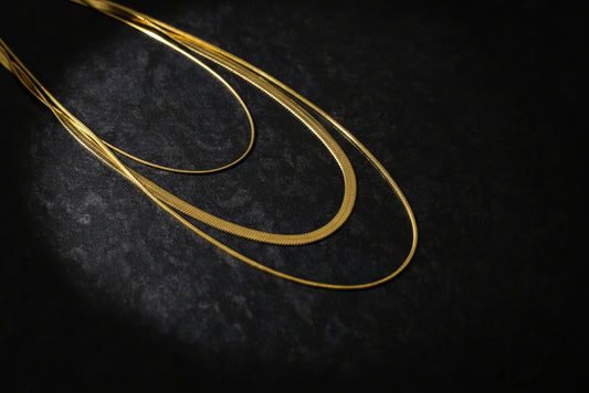 18k gold plated layered snake chain necklace with elegant, smooth texture and shiny finish