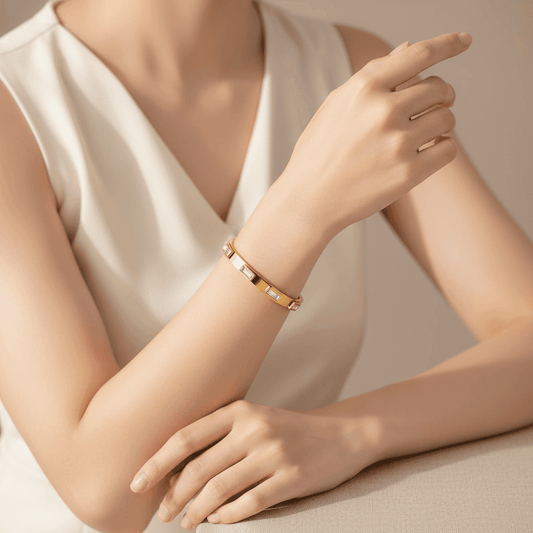 Elegant 18k gold plated stainless steel bangle displayed on a wrist for a stylish accessory look