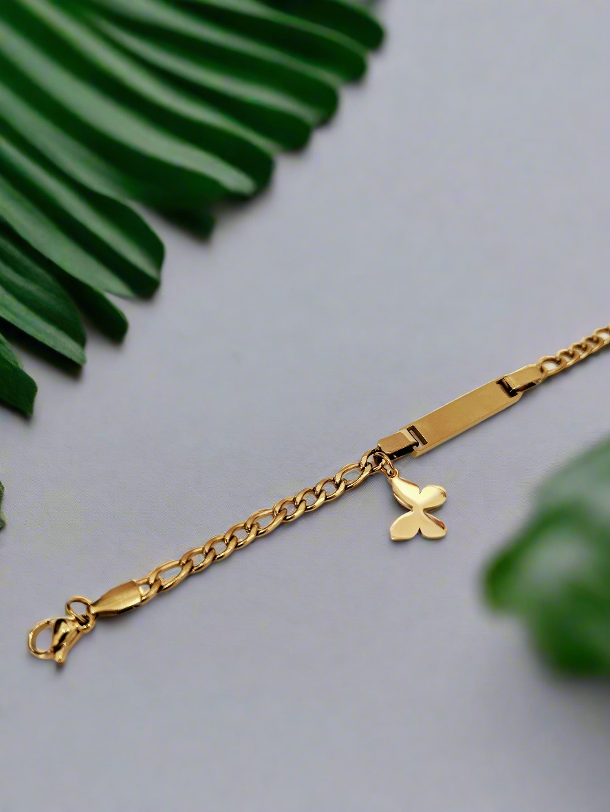 Gold butterfly bracelet from Lustre of Love with delicate chain and small butterfly charm