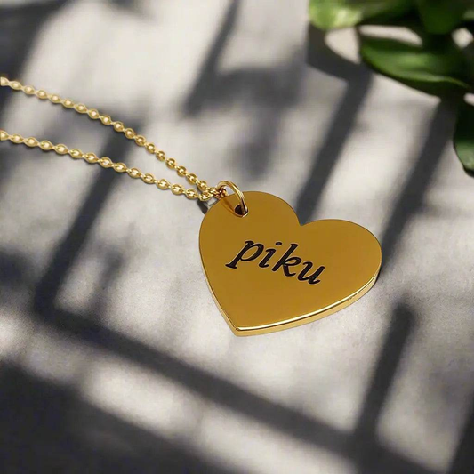 Lustre of Love gold heart pendant necklace with engraved custom text piku on a delicate chain