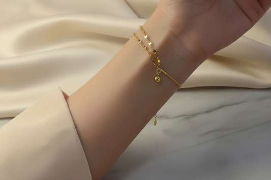 Lustre of Love Orb and Link bracelet in gold with delicate chain and charm for elegant styling