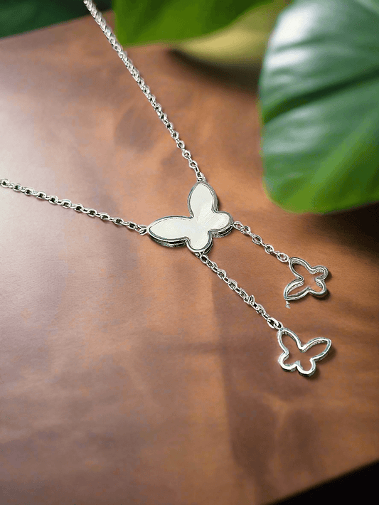 Lustre of Love silver butterfly pendant necklace with three butterfly charms on delicate chain