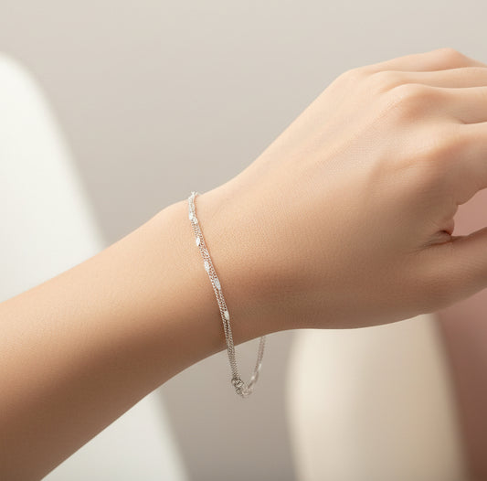 Elegant silver Korean double layer bracelet showcased on a model's wrist for stylish accessorising