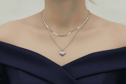 Elegant silver layered heart necklace featuring a delicate chain with a heart pendant
