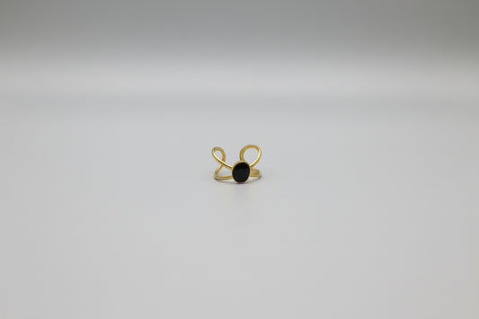 Elegant Lustre of Love gold ring featuring a black stone and stainless steel adjustable size design