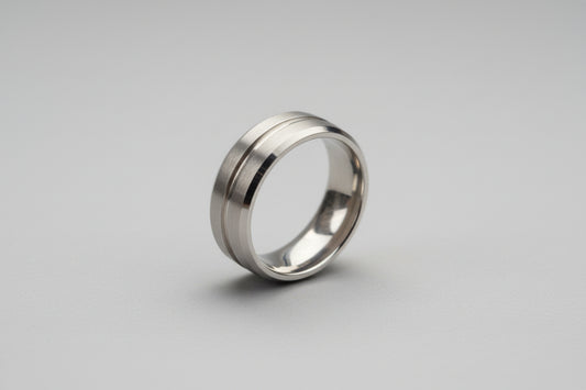 Lustre of Love stainless steel silver ring for men with a sleek, modern design and subtle grooves
