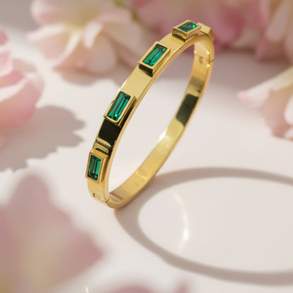 18k gold plated green zircon bangle with elegant rectangular stones and a shiny finish