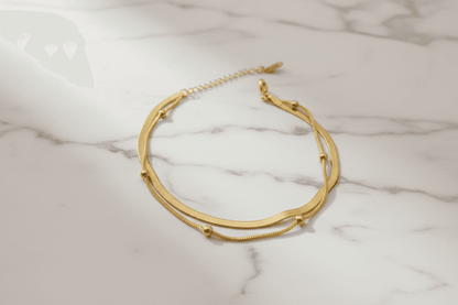 Dual-layer 18k Gold-Plated Stainless Steel Bracelet with a Snake Chain Design and floating beads