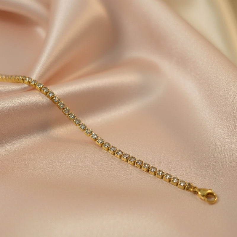 Elegant 18k gold plated tennis bracelet with sparkling stones, perfect for any occasion