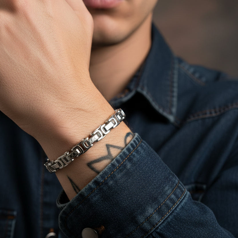 Stylish Byzantine Chain Bracelet in Silver worn on a wrist with a denim jacket