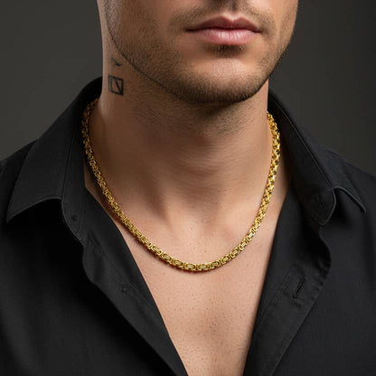 Byzantine Gold Chain necklace worn by a man, showcasing its intricate design and luxurious shine