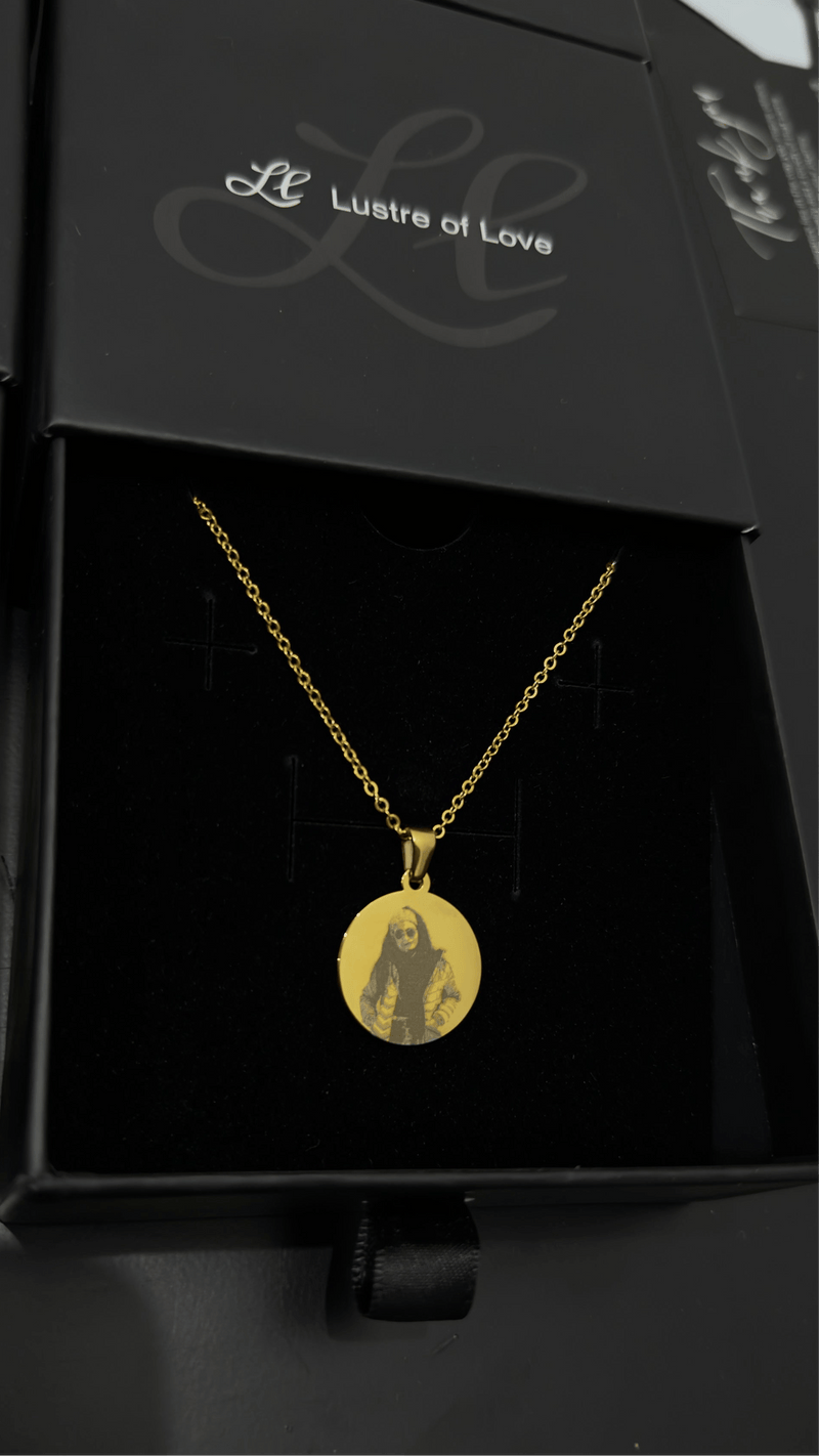 Custom round pendant from Lustre of Love displayed in elegant black box with soft lining