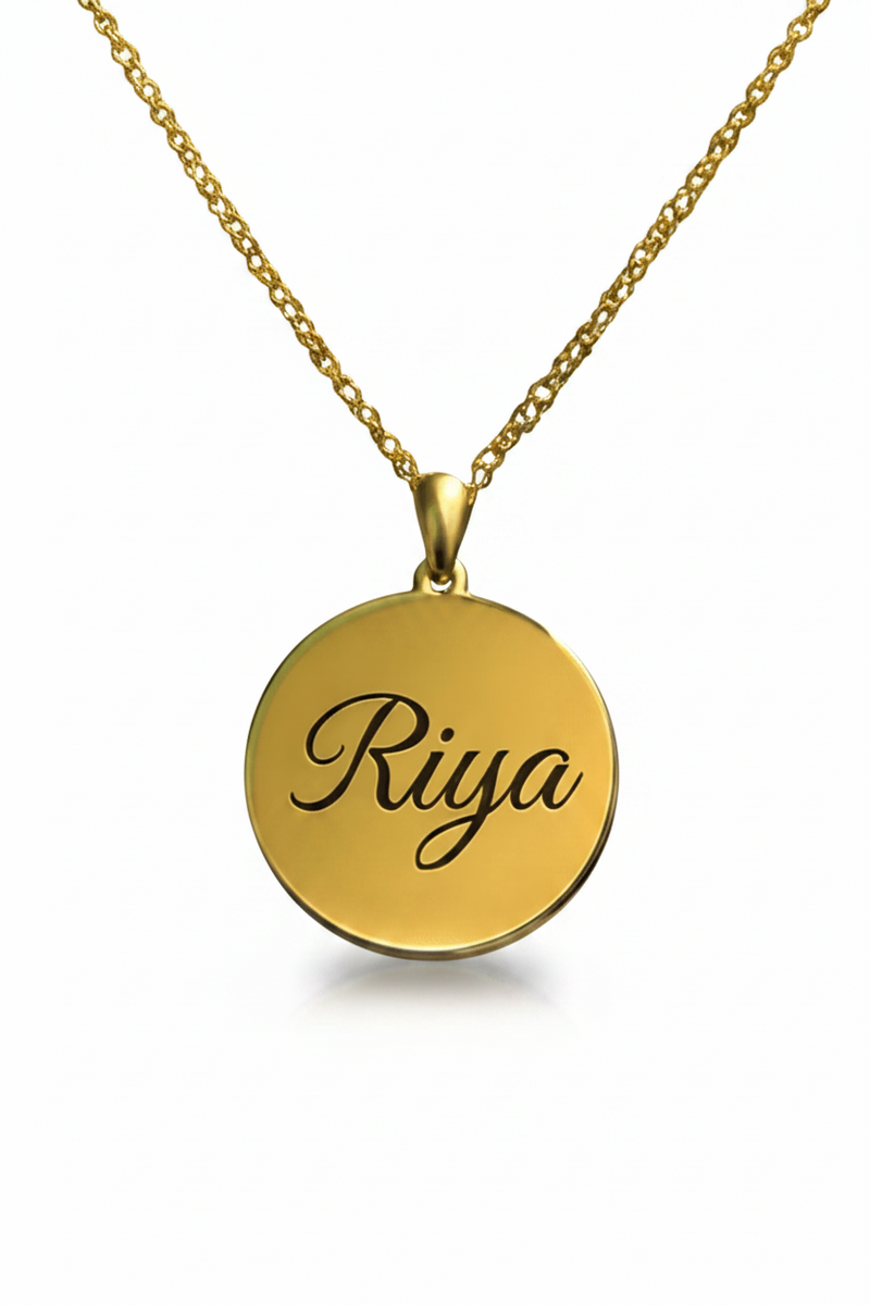 Custom round pendant in gold with personalized engraving of the name Riya, elegant and stylish necklace