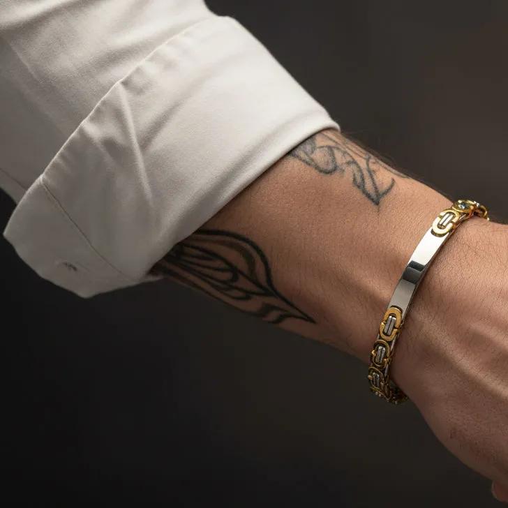 Dual tone byzantine bracelet worn on a wrist showcasing elegant design and craftsmanship
