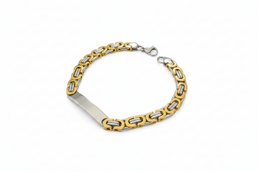 Dual tone byzantine bracelet featuring gold and silver links with a sleek silver plate