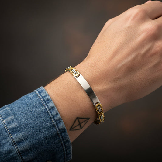 Stylish dual tone byzantine bracelet on a wrist, blending silver and gold tones for modern elegance