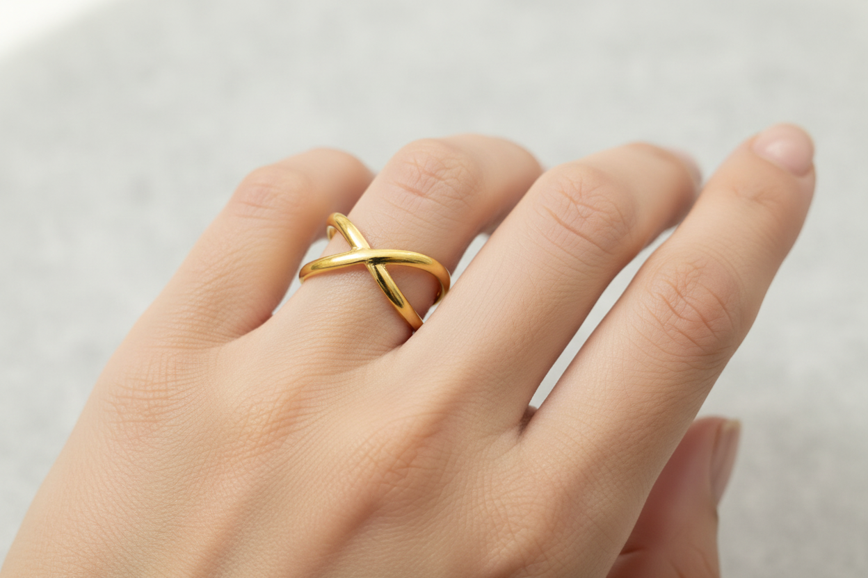 Lustre of Love Stainless Steel Adjustable Size Ring with a Unique Cross Design on a Hand