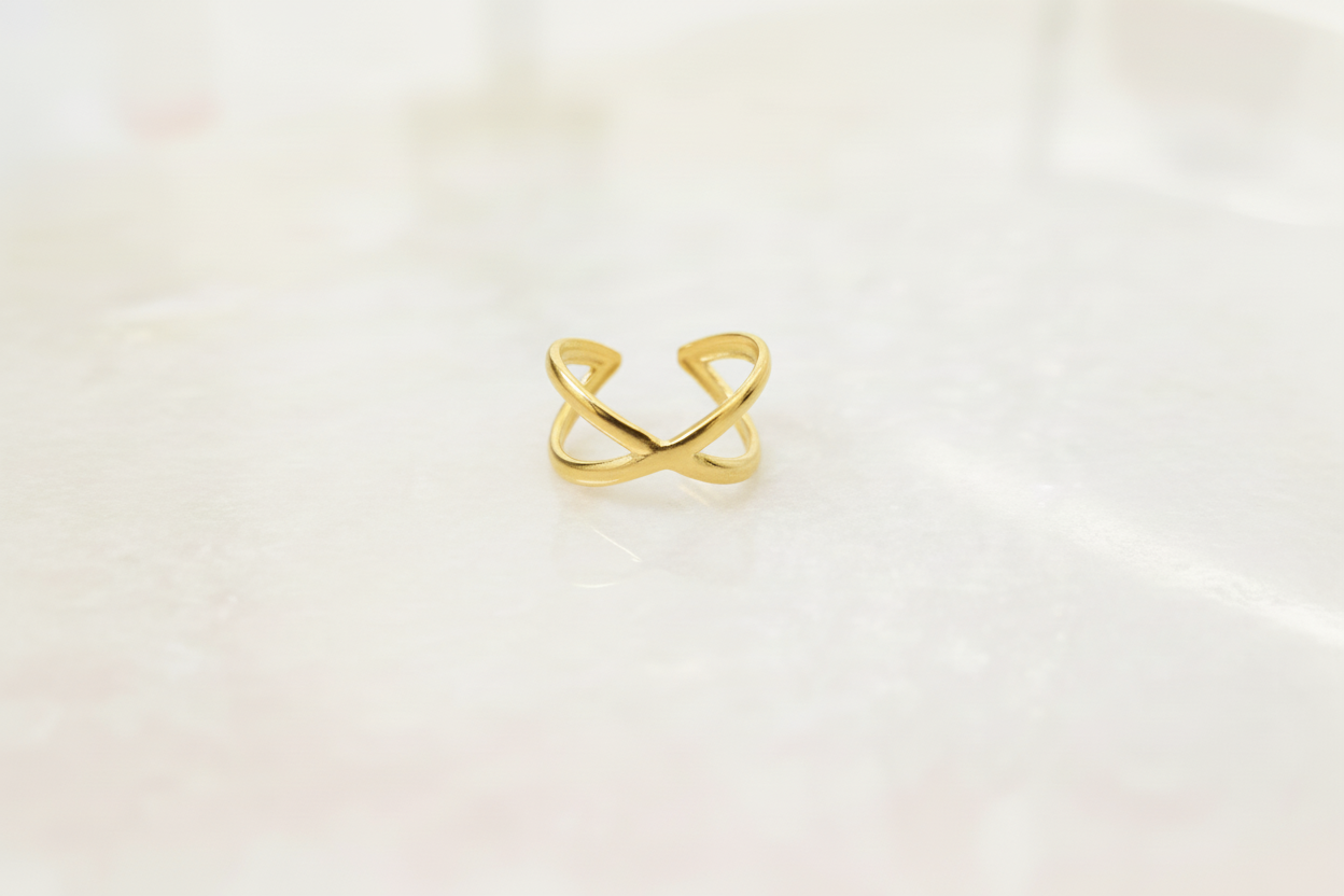 Gold Lustre of Love ring in a unique crossover design, stainless steel adjustable size for a perfect fit