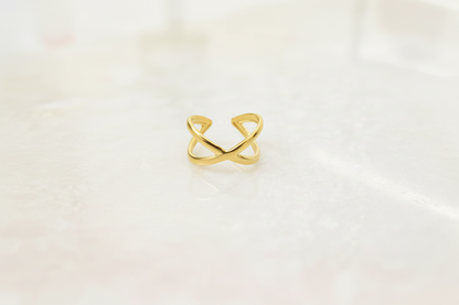 Gold Lustre of Love ring in a unique crossover design, stainless steel adjustable size for a perfect fit