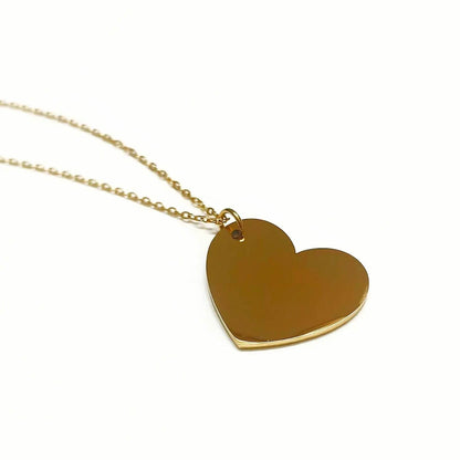 Gold heart pendant necklace with smooth polished surface on delicate chain by Lustre of Love