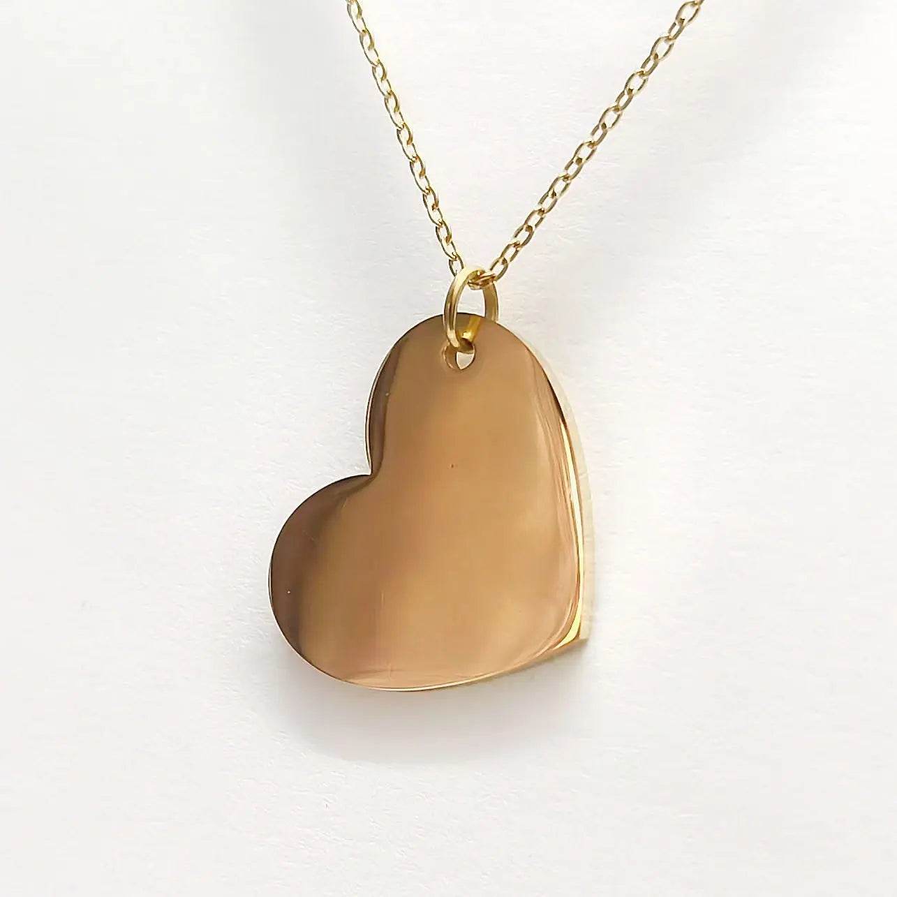 Lustre of Love polished gold heart pendant on a delicate chain necklace