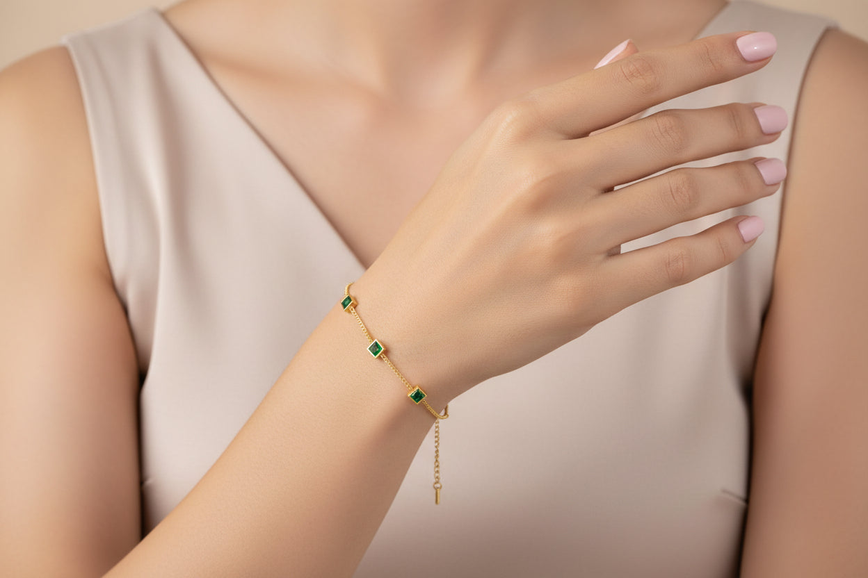Elegant green zircon bracelet gold plated featuring stunning emerald-like stones on a delicate chain