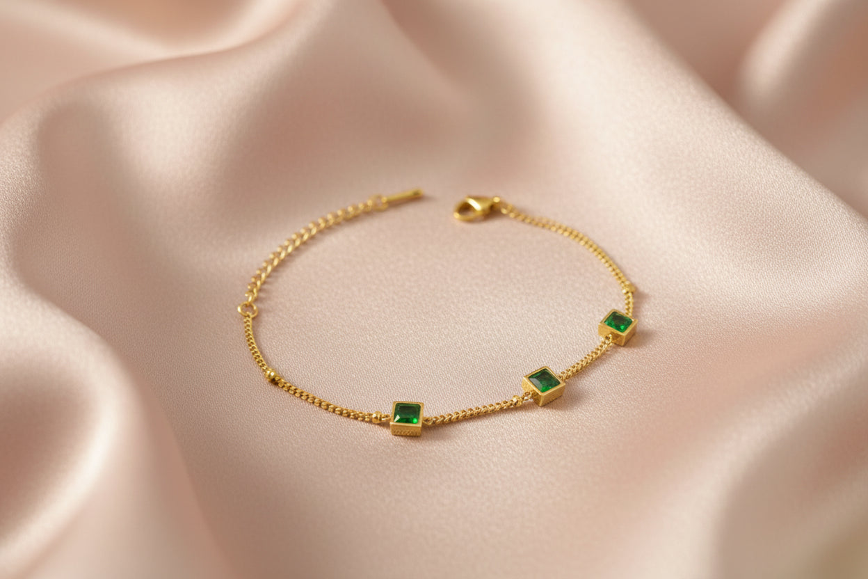 Elegant green zircon bracelet gold plated with sparkling square stones on a delicate chain