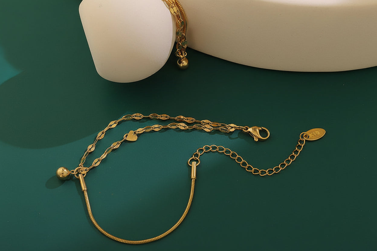 Lustre of Love Orb and Link bracelet in gold with elegant chain design and adjustable length