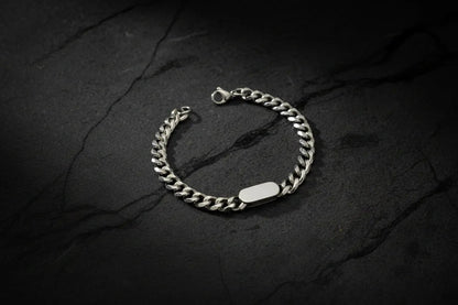 Personalized Cuban link bracelet for men in silver with a sleek design and secure clasp