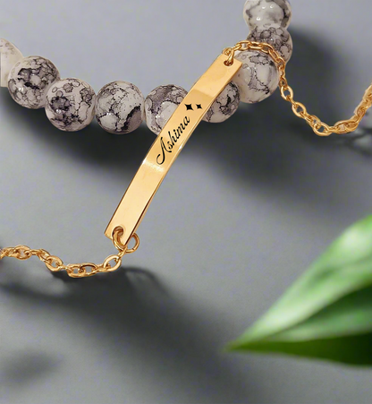 Lustre of Love personalized gold bar bracelet with engraved name and beaded accents