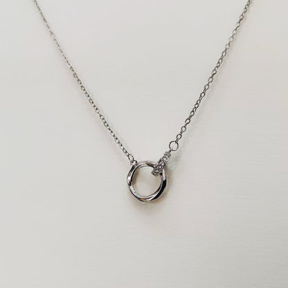 Lustre of Love silver chain necklace with a shiny interlocked ring pendant featuring a small diamond accent