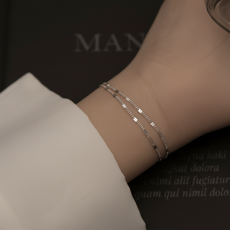 Elegant Lustre of Love silver Korean double layer bracelet on a wrist for stylish accessorising