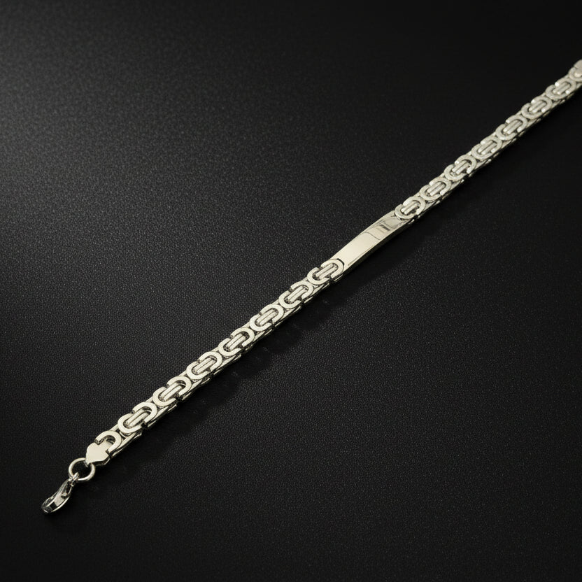 Elegant silver-toned Byzantine bracelet showcasing intricate chain design and secure clasp