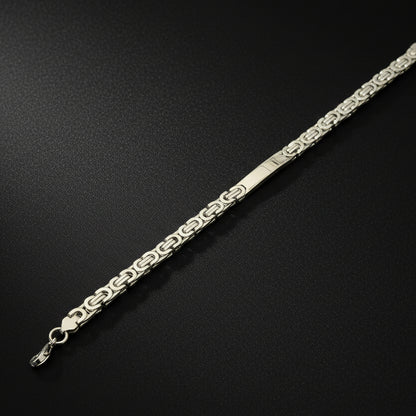 Elegant silver-toned Byzantine bracelet showcasing intricate chain design and secure clasp