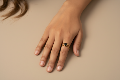 Lustre of Love stainless steel adjustable size ring with a black gemstone, elegantly displayed on a hand