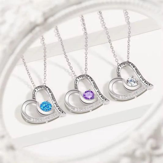 Lustre of Love silver moon and heart pendant necklaces with blue, purple, and clear stones