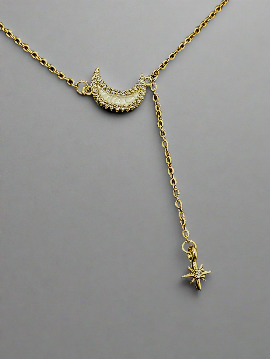 Lustre of Love gold necklace with crescent moon and dangling star charm pendant